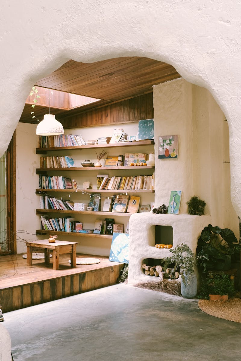 Free stock photo of bookshelf, coffee, home decoration